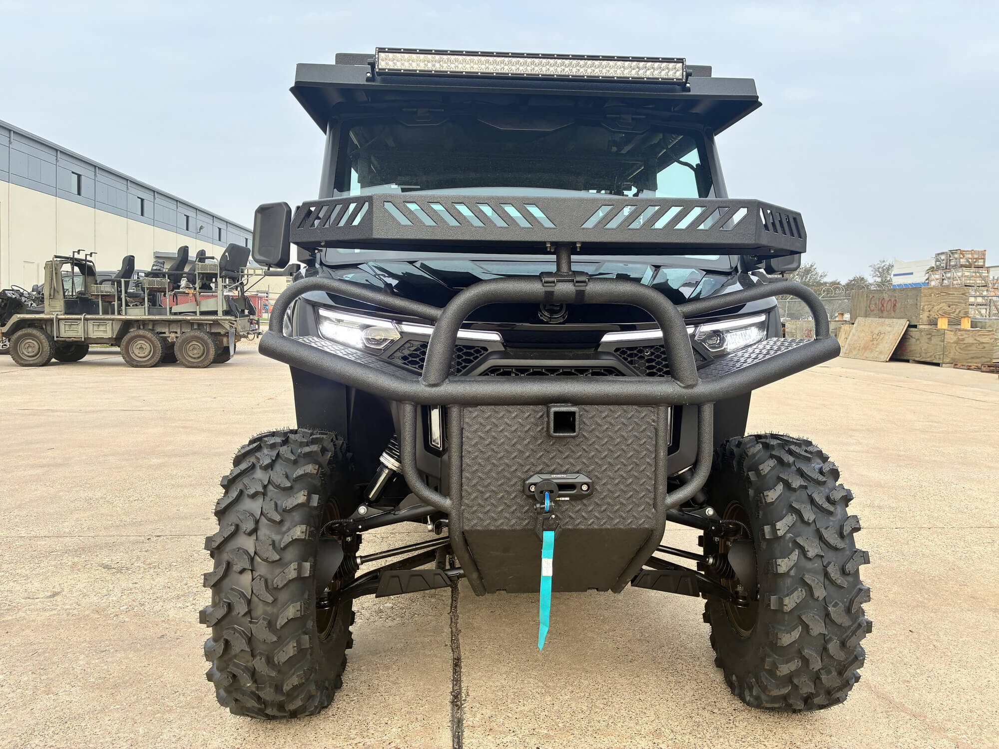 CFMOTO UFORCE with Big Country Outdoors front bumper, winch and front basket